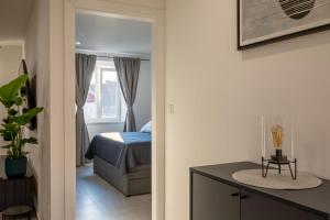 Postel nebo postele na pokoji v ubytování Apartment Centar 2
