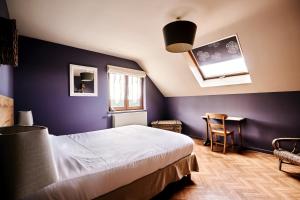 Letto o letti in una camera di Gîte des Crêtes
