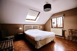 Letto o letti in una camera di Gîte des Crêtes