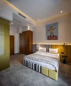 Postel nebo postele na pokoji v ubytování Maison Royale + 37 fotografií