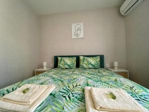 Postel nebo postele na pokoji v ubytování AVRORA SUITE