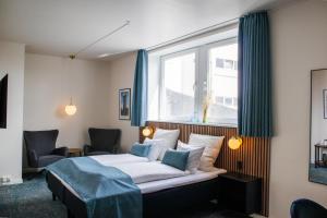 Hotel Phønix Hjørring 객실 침대