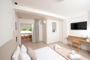 Телевизор и/или развлекательный центр в CK Apartments