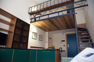 A bed or beds in a room at Hotel Fontana Olente