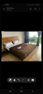 Voodi või voodid majutusasutuse Rock View Resort toas