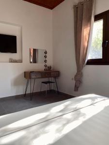 TV a/nebo společenská místnost v ubytování Moxy Paxos - Cozy Home