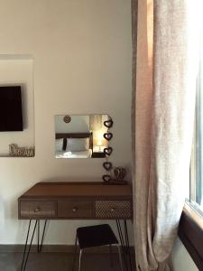 TV a/nebo společenská místnost v ubytování Moxy Paxos - Cozy Home