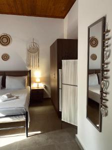 Postel nebo postele na pokoji v ubytování Moxy Paxos - Cozy Home