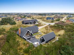an overhead view of a house with solar panels at Vacation Home Renovated In 2023 With A 6-Person Hot Tub - 1010 in Ringkøbing