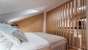 Posteľ alebo postele v izbe v ubytovaní Apartmán RICHELIEU