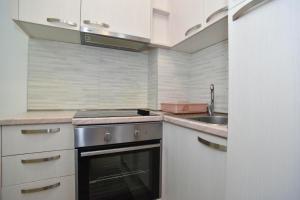 Η κουζίνα ή μικρή κουζίνα στο Petra Apartment