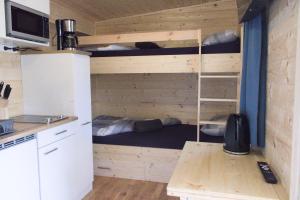 Kuchyň nebo kuchyňský kout v ubytování Wooden Dream