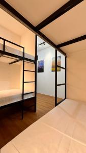 Postel nebo postele na pokoji v ubytování Puy-An, A Nomad Hostel