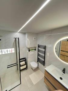 Koupelna v ubytování SiestaKey Apartmán 14 + 2 fotografie