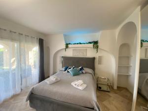 Katil atau katil-katil dalam bilik di Sardinia Art House +42 gambar