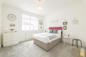 Ένα ή περισσότερα κρεβάτια σε δωμάτιο στο Luxury 4 Bedroom Apartment Southsea - Free Parking