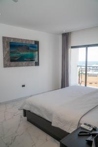 Postel nebo postele na pokoji v ubytování Manta Surf Hotel + 36 fotografií