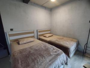Tempat tidur dalam kamar di Villa Cassandra
