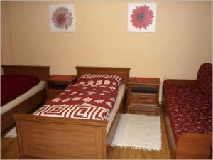 Posteľ alebo postele v izbe v ubytovaní Penzión v údolí