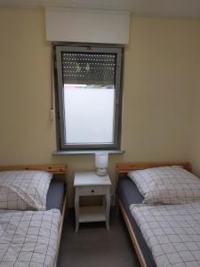 Ένα ή περισσότερα κρεβάτια σε δωμάτιο στο Bungalenz