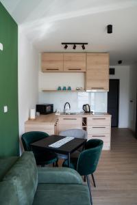 O bucătărie sau chicinetă la Apartmani Laketić