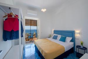 Postel nebo postele na pokoji v ubytování Casa al sole - La terrazza sul Mare