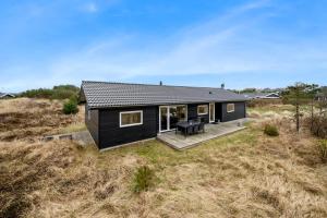 Bygningen som feriehuset ligger i