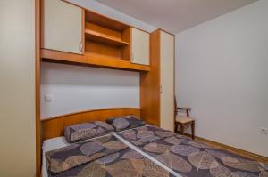 Postel nebo postele na pokoji v ubytování Apartman Lucia