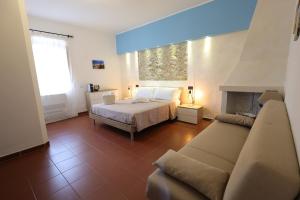 Postel nebo postele na pokoji v ubytování Il Quadrifoglio B&B