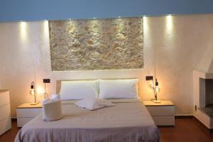 Postel nebo postele na pokoji v ubytování Il Quadrifoglio B&B