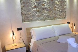 Postel nebo postele na pokoji v ubytování Il Quadrifoglio B&B