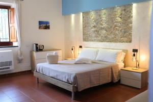 Postel nebo postele na pokoji v ubytování Il Quadrifoglio B&B