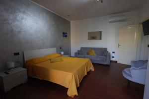 Postel nebo postele na pokoji v ubytování Il Quadrifoglio B&B
