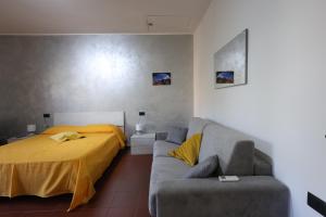 Postel nebo postele na pokoji v ubytování Il Quadrifoglio B&B