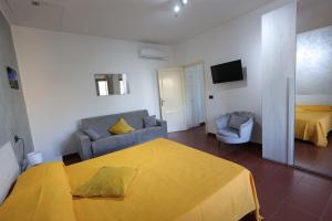 Postel nebo postele na pokoji v ubytování Il Quadrifoglio B&B