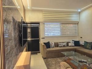 Posezení v ubytování Agréable maisonnette au centre de Rabat