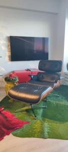 Ein Sitzbereich in der Unterkunft Superbe appartement digue vue mer