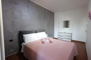 Postel nebo postele na pokoji v ubytování Il Quadrifoglio B&B