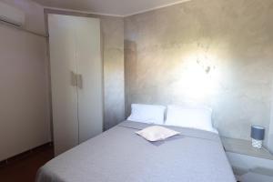 Postel nebo postele na pokoji v ubytování Il Quadrifoglio B&B