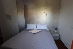 Postel nebo postele na pokoji v ubytování Il Quadrifoglio B&B