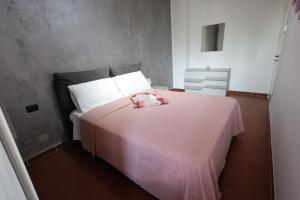 Postel nebo postele na pokoji v ubytování Il Quadrifoglio B&B