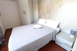 Postel nebo postele na pokoji v ubytování Il Quadrifoglio B&B