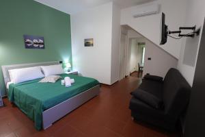Postel nebo postele na pokoji v ubytování Il Quadrifoglio B&B
