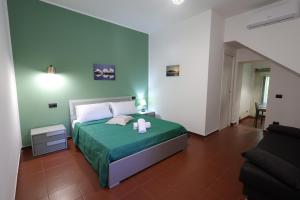 Postel nebo postele na pokoji v ubytování Il Quadrifoglio B&B