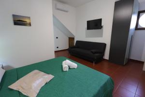 Postel nebo postele na pokoji v ubytování Il Quadrifoglio B&B