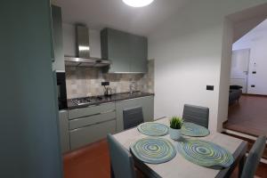 Kuchyň nebo kuchyňský kout v ubytování Il Quadrifoglio B&B + 30 fotografií