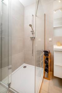 Koupelna v ubytování Łódź Manufaktura - Balcony & Workspace by Rentujemy