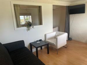 Posezení v ubytování Kapelludden Östra Öland