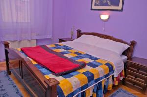 Ein Bett oder Betten in einem Zimmer der Unterkunft Hotel Čile