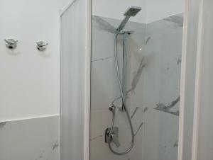 Koupelna v ubytování NIU Rooms